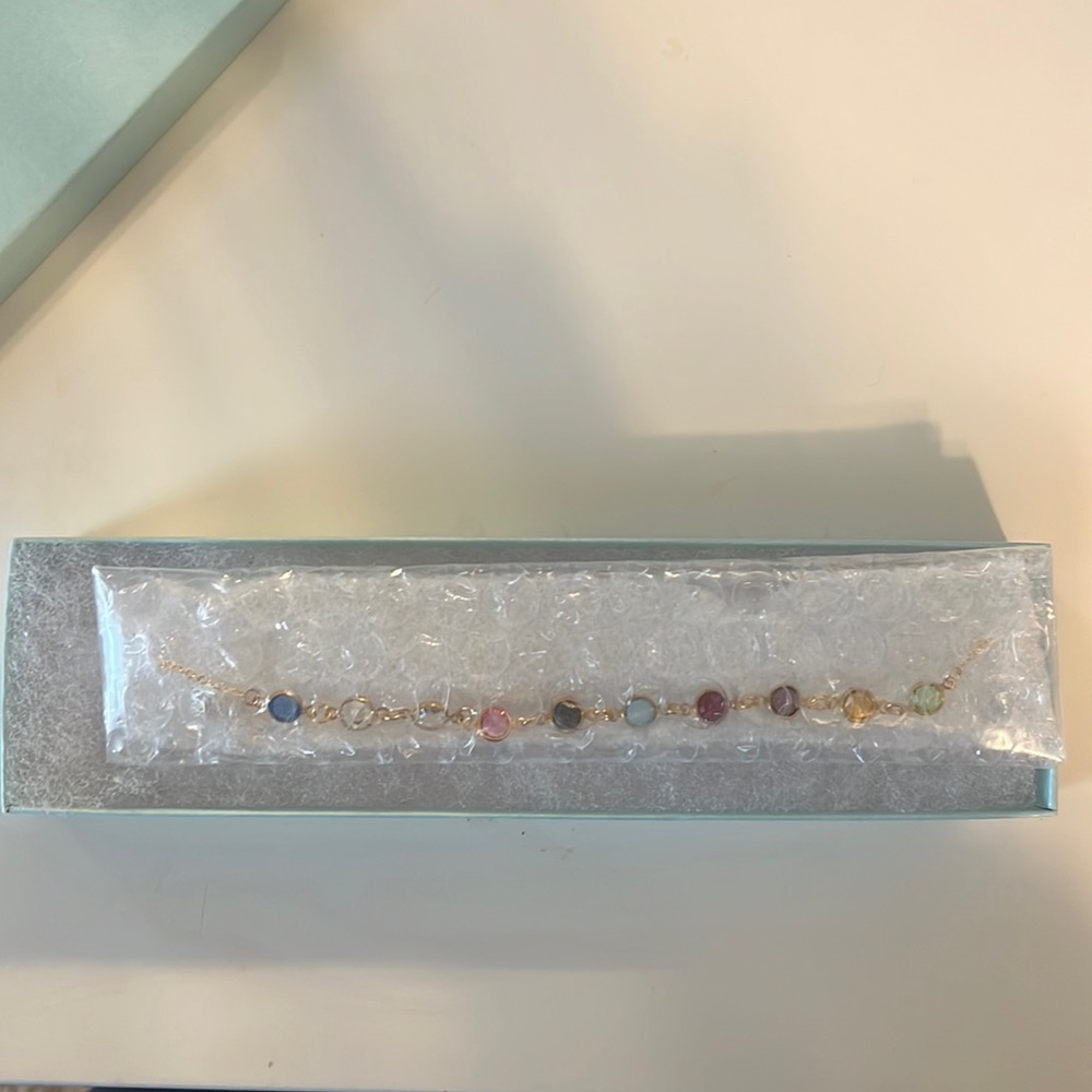 Taylor Swift Necklace with different colors for the different albums